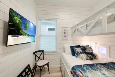 Bunk room with twin over queen beds plus TV