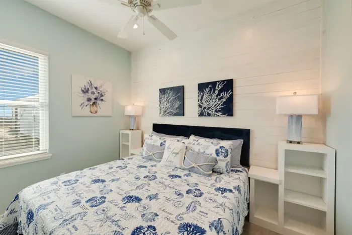 One of two bedrooms with king bed