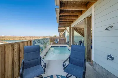 Relax by the pool after a long day at the beach