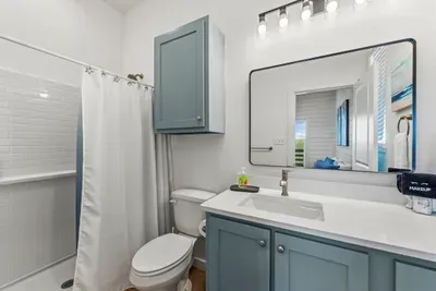 Ensuite bathroom in king bedroom on lower level