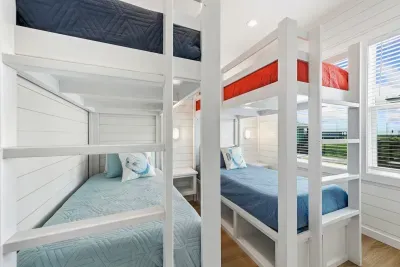 A smart, space-saving room that doesn't compromise on comfort. This cozy setup makes it easy to fit the whole crew together in one fun spot.