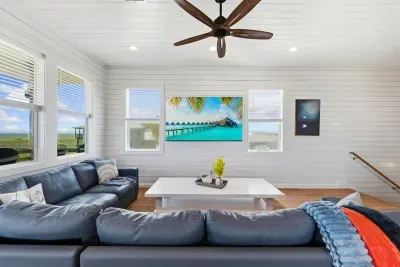 An open, light-filled living space that serves as a relaxing retreat during your stay. Kick back, stream your favorite shows, and enjoy the calm vacation atmosphere.
