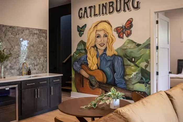 Second living area with mini bar and mural of our favorite country singer, Dolly Parton