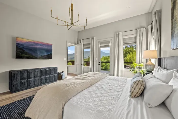 Wake up to beautiful views of the mountains in one of the two primary bedrooms