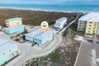 House is located right next to the golf cart friendly boardwalk.