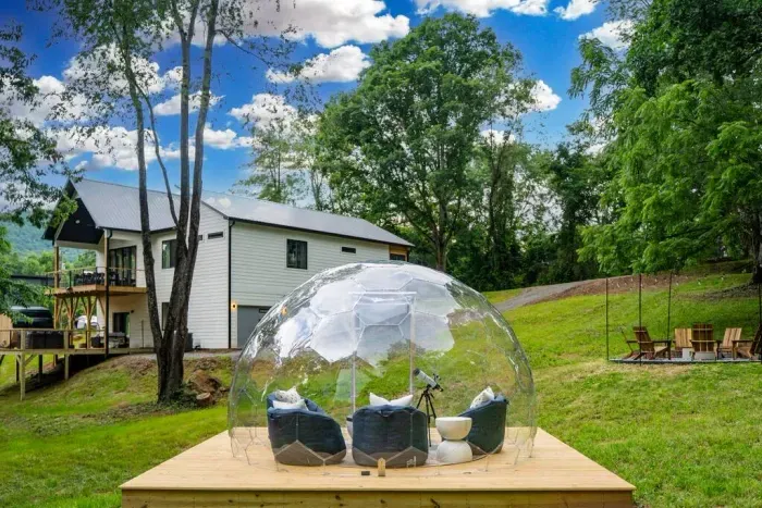Relax in the cozy skygazing dome, one of many fun spots in the spacious backyard—perfect for starry nights, good company, and making memories.