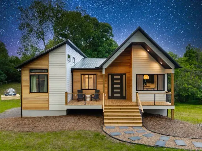 This brand new modern Scandinavian retreat offers 3,450 sq ft with 5 bedrooms, 9 beds, and sleeps 18. Set on 1.5 acres, it’s a cozy escape just minutes from the Blue Ridge Parkway, downtown Asheville, and the airport.