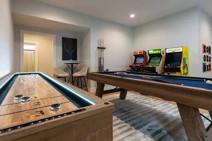 Step into the game room where fun never ends—challenge friends to pool, shuffleboard, foosball, or classic arcade games like Pac-Man, Golden Tee, and NBA Jam. Plus, life-size chess, checkers, and tic-tac-toe on the walls add extra fun.