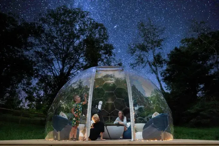 Unwind in the cozy skygazing dome, complete with bean bag chairs, a telescope, and soft LED lighting—ideal for relaxing nights and star-filled conversations.