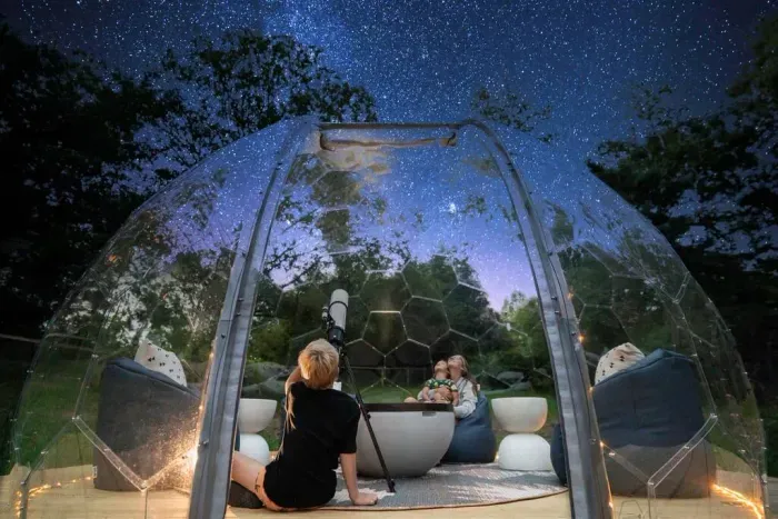 Unwind in the cozy skygazing dome, complete with bean bag chairs, a telescope, and soft LED lighting—ideal for relaxing nights and star-filled conversations.