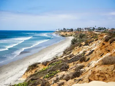 Aerial view of Carlsbad Village coastline near La Costa and Bressi Ranch neighborhoods