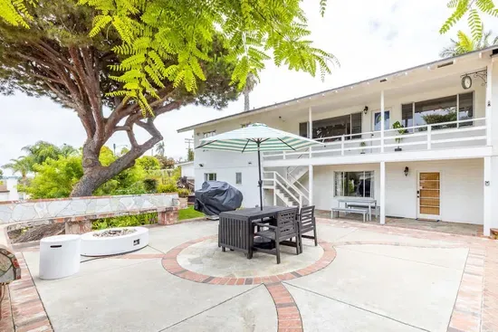 Relax under the umbrella, fire up the grill, and soak in the tranquil ambiance of this beautiful outdoor space, perfect for entertaining or unwinding.