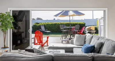 Indoor comfort flows right onto your sun-drenched outdoor patio. Open the doors and embrace the coastal lifestyle!