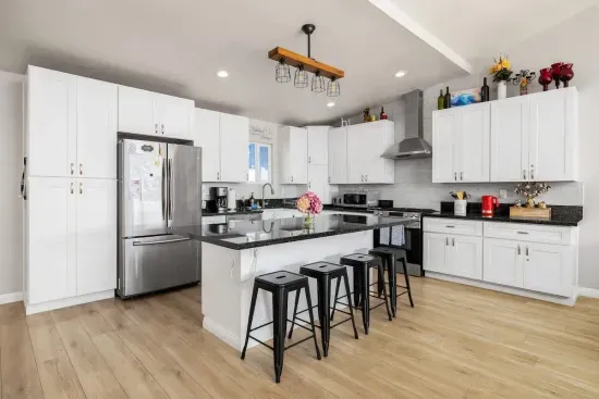 This kitchen is as beautiful as it is functional. Featuring contemporary design, all the necessary cooking essentials, and ample counter space, you're ready for any meal. Gather around the stylish breakfast bar with seating to enjoy a quick bite.