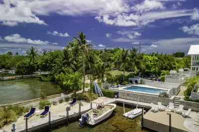 Often empty community pool and lounging