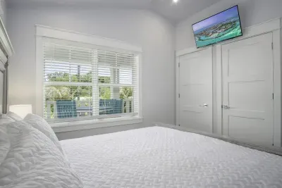 2nd floor bedroom with fan, Smart TV and closets