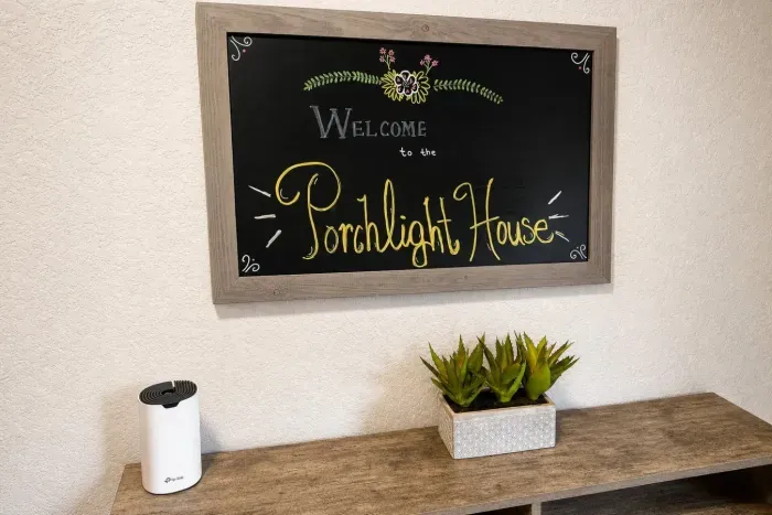 Porchlight House welcome sign
