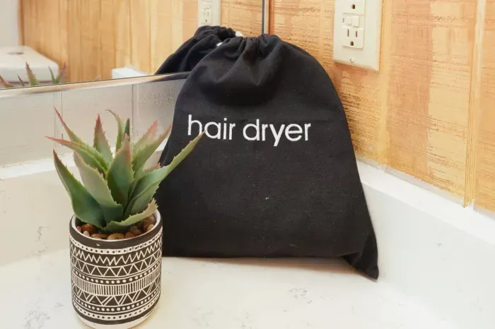 Pack light and travel easy with our included hair dryer in every full bathroom. Enjoy the convenience of having everything you need right at your fingertips, making your stay with us effortless and stress-free.