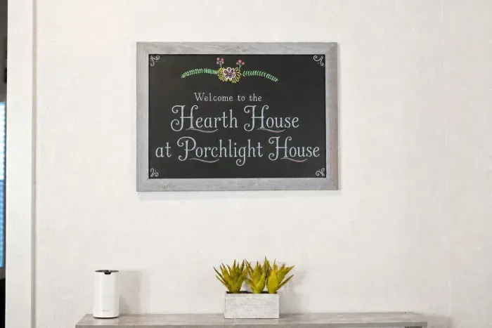 Hearth_House_at_Porchlight_House_welcome_AI_pro