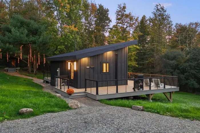 As twilight settles over Fernova, The Kimberly glows with warm light against the trees. Unwind on the deck surrounded by beautiful string lights that light up the sauna area.