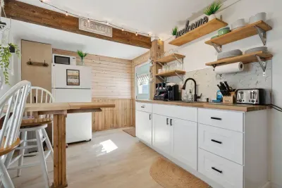 Front cottage fully renovated (spring 2022) eat-in kitchen with butcher block countertops.