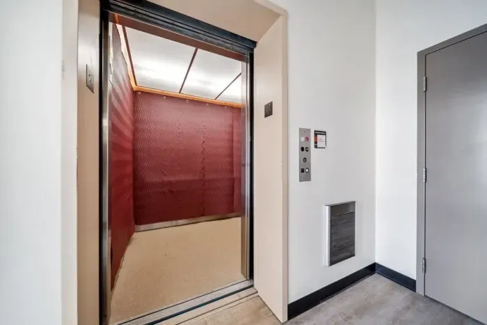 Elevator from ground level to common courtyard and main entrance