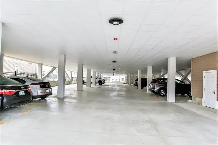 1 complimentary covered garage parking spot