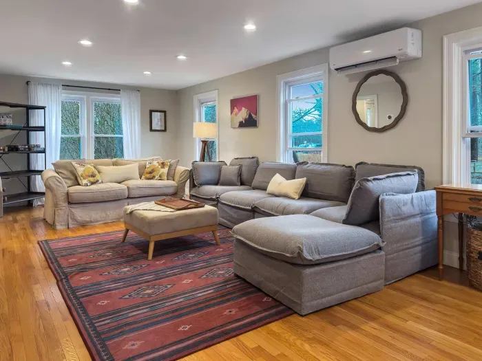 New grey sectional sofa! Mini split heating and cooling, smart TV, and Sonos sound bar make this the perfect family room!