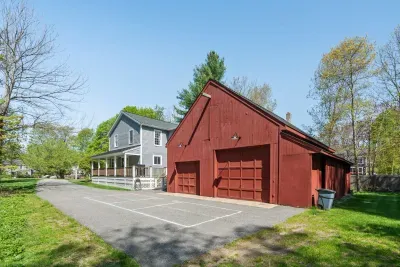 Large driveway with a pickle-ball court!