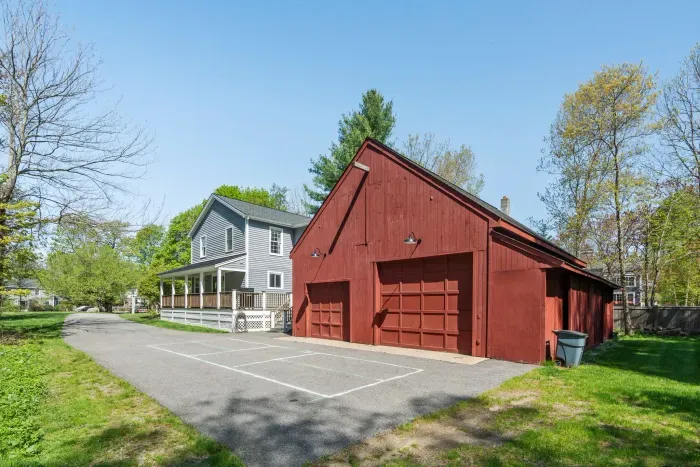 Large driveway with a pickle-ball court! 