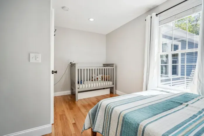The fourth bedroom with a full bed, crib, and changing table. Clean linens provided!