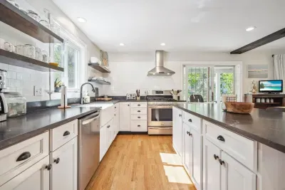 Fully equipped kitchen with dishwasher! This space is perfect for family gatherings. High chair is located in the kitchen.