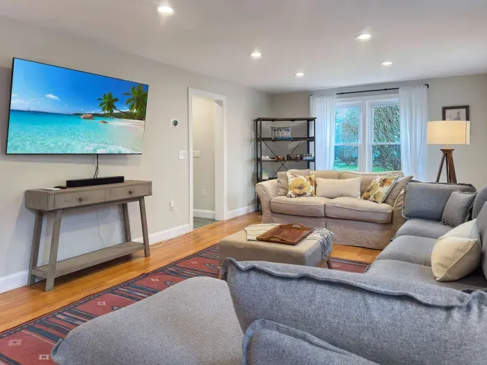 New grey sectional sofa! Mini split heating and cooling, smart TV, and Sonos sound bar make this the perfect family room!