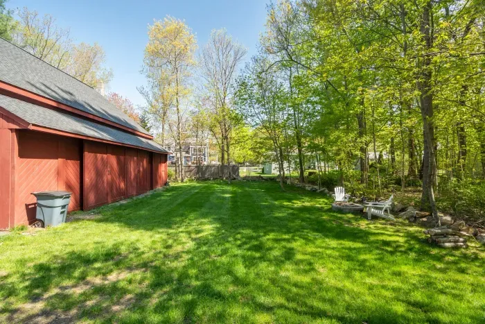 The backyard area with a fire pit