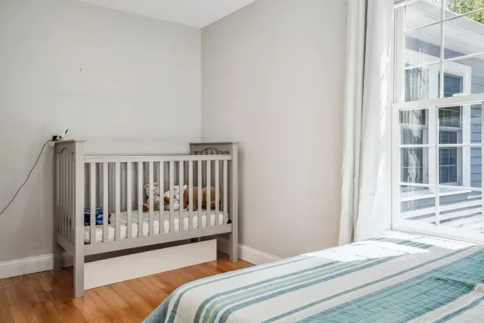 The fourth bedroom with a full bed, crib, and changing table. Clean linens provided!