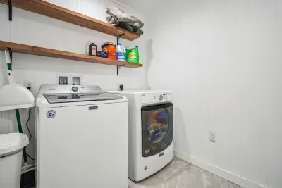 Laundry room located on the second level where all the bedrooms are located.