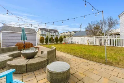The backyard space is shared with other units on the property. There are 2 gas grills and a fire pit here that you are welcome to use!