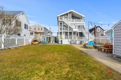 The backyard space is shared with other units on the property. There are 2 gas grills and a fire pit here that you are welcome to use!