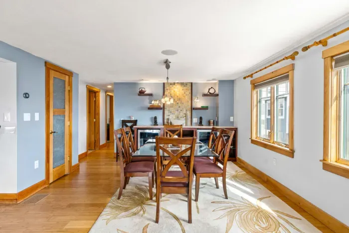 Dining area off of the ktichen with seating for 6 and a wet bar with two drink fridges!
