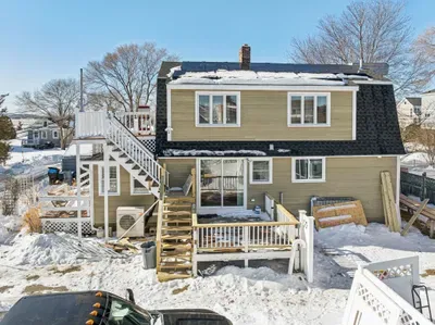 View of the back deck. Please note your unit is located on the first floor.