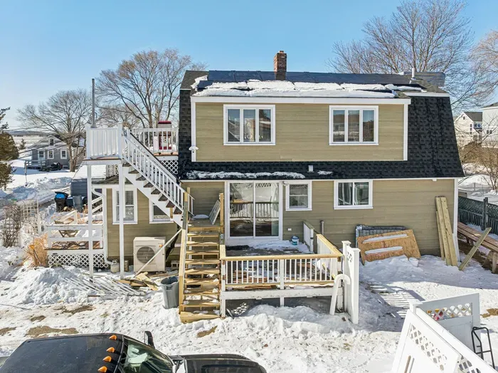 View of the back deck. Please note your unit is located on the first floor.