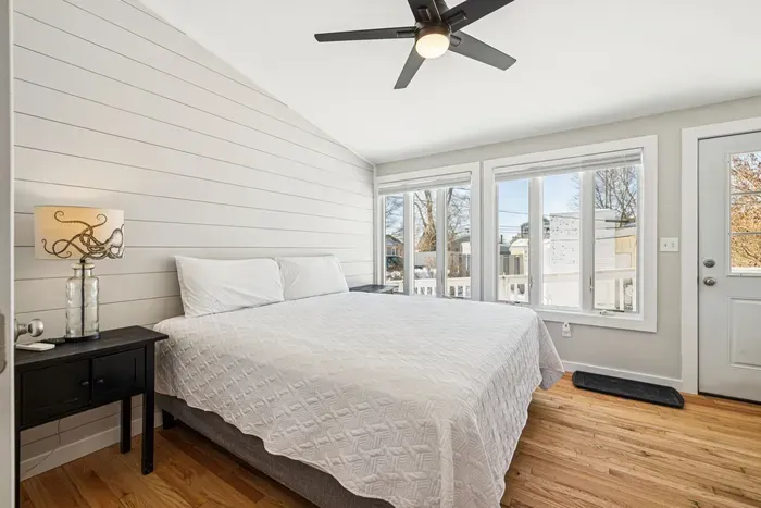 The primary bedroom with a king bed, smart TV, minisplit heating/cooling, and plenty of natural light! Clean linens provided.