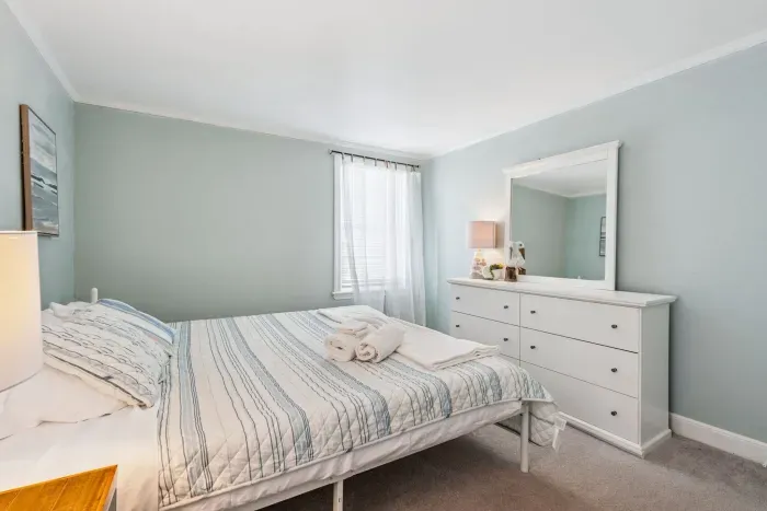 Front unit Primary bedroom with a Queen bed. Clean linens provided