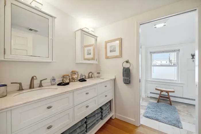 The second floor bathroom - fully renovated with a standing shower. Clean towels provided for all guests