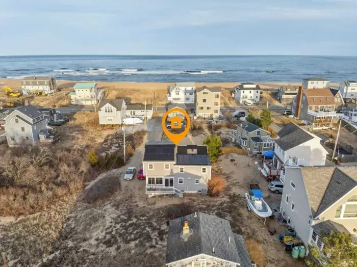 An aerial of the home. It is located just steps to the beach!