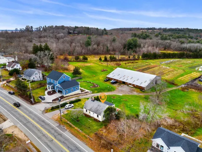Aerial view, home overlooking the private organic produce farm