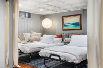 Additional sleeping space with deluxe rollaway twin beds kept in  the storage closet until needed