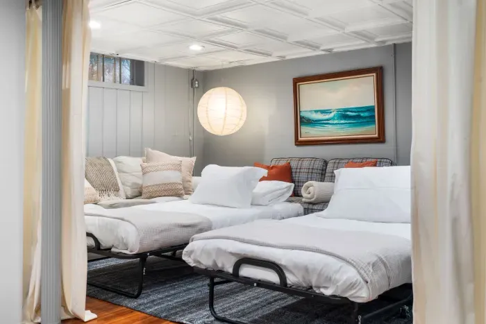 Additional sleeping space with deluxe rollaway twin beds kept in  the storage closet until needed