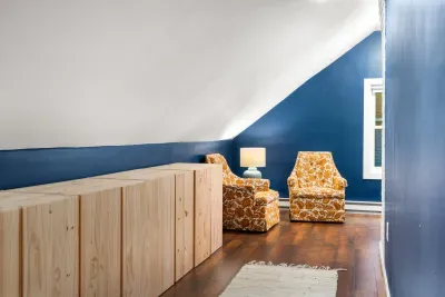 Plenty of storage in the primary bedroom and a cozy corner to read in!