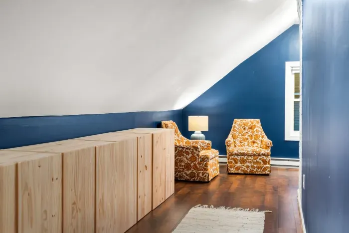 Plenty of storage in the primary bedroom and a cozy corner to read in!